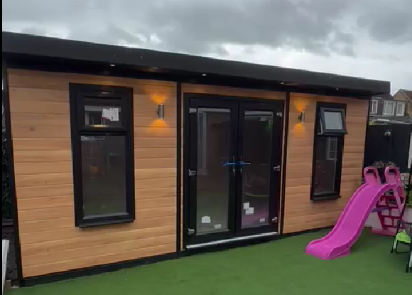 Black uPVC colour option for cedar-colour composite garden rooms | Shed King